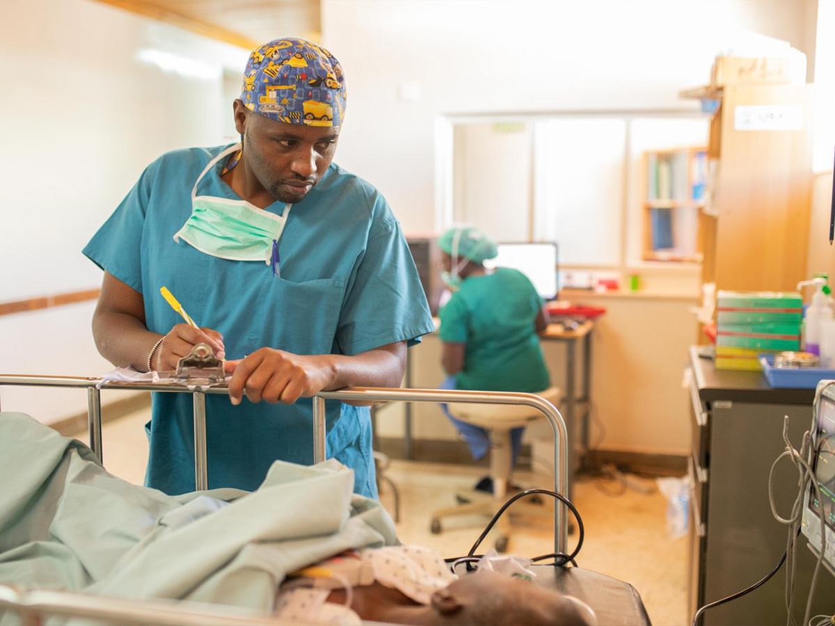 Doctor visiting child in hospital